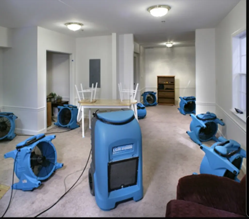 Air movers and dehumidifier setup for Water Damage Restoration in Jenks