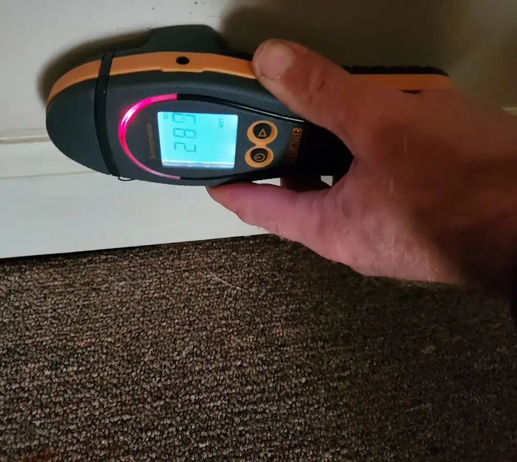 Moisture detection at baseboard during Sewage Cleanup & Sanitation in Jenks